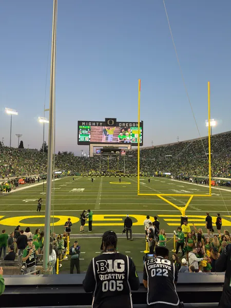 The scoreboard and goalposts above the field.