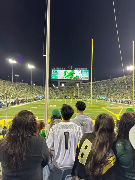 The end zone and video board during the night game.