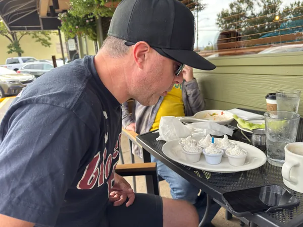 A quiet moment after the plate arrives.