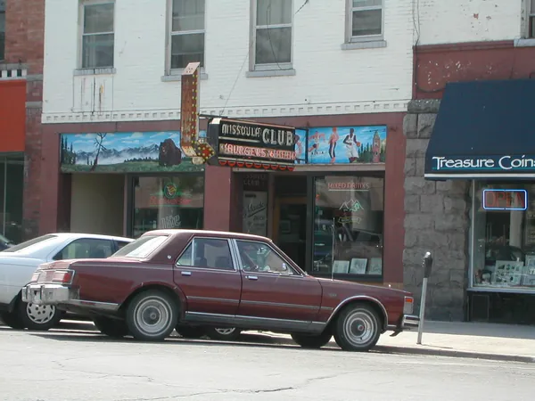 Storefronts along a small-town street.