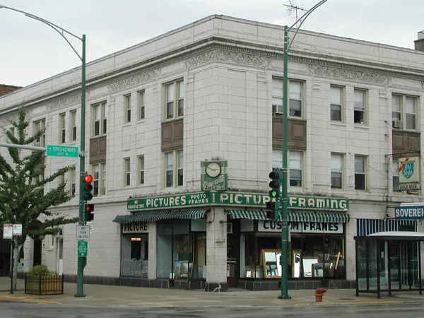 A historic theater building across the street.
