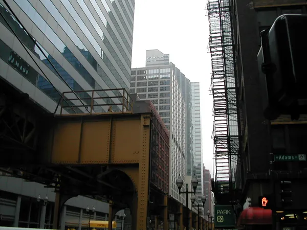 Buildings and an elevated train line downtown.