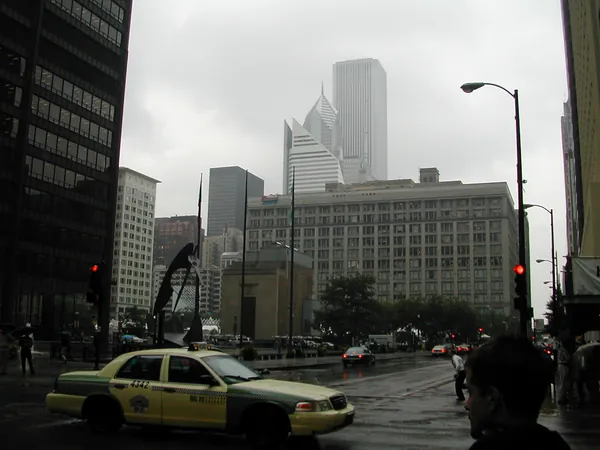 Traffic moves through the city beneath the skyline.