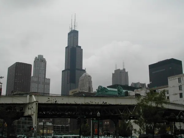 The skyline with its tallest dark tower in the distance.