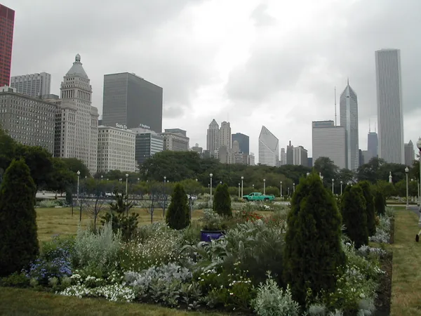 Downtown Chicago seen across a landscaped park.