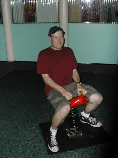 Another traveler tries the arcade ride.