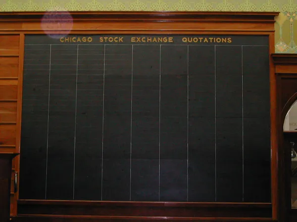 A large departures board inside the hall.