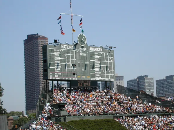 The scoreboard and flags above the bleachers.