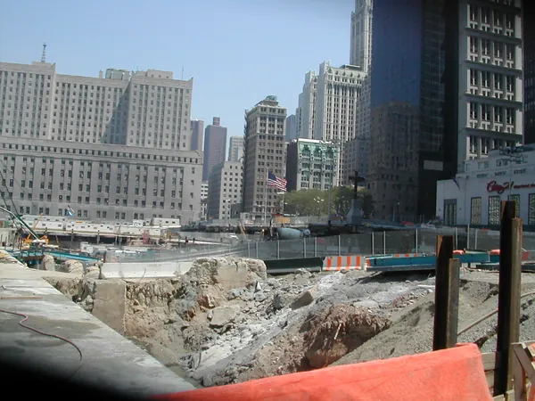 The site seen from behind a temporary barrier.