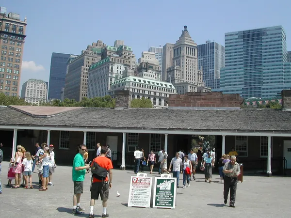Visitors gather outside a transportation terminal.