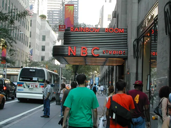 Travelers approach the NBC complex.