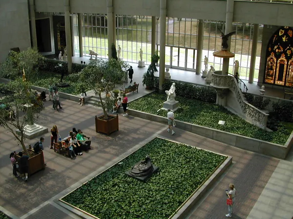An indoor garden atrium viewed from above.