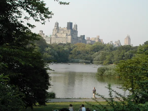 Buildings seen across a Central Park lake.