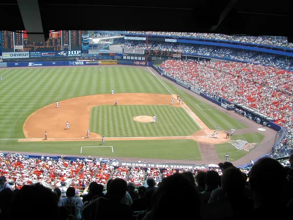 A baseball game viewed from high in the stadium.