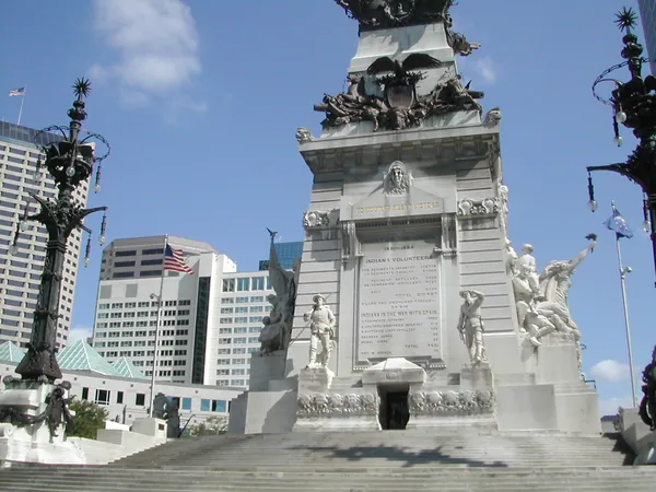 A tall civic monument and fountain.