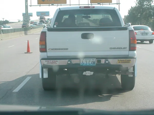 The same pickup approaching a toll lane.