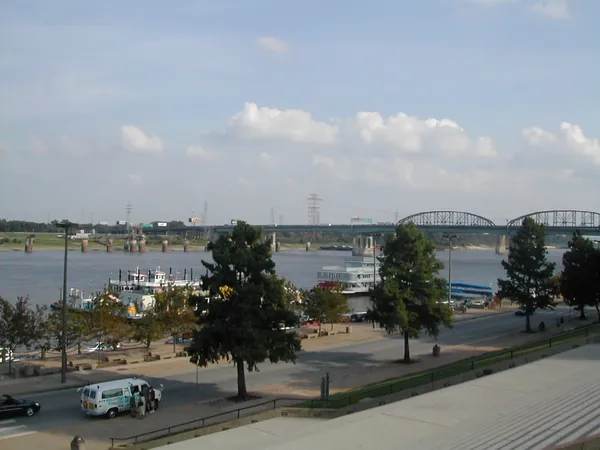 Riverfront roads and bridges beside the water.