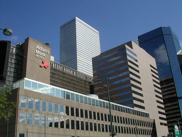 Downtown buildings and a large hotel sign.