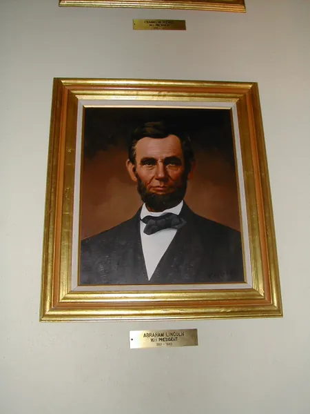 A framed portrait in a civic building.