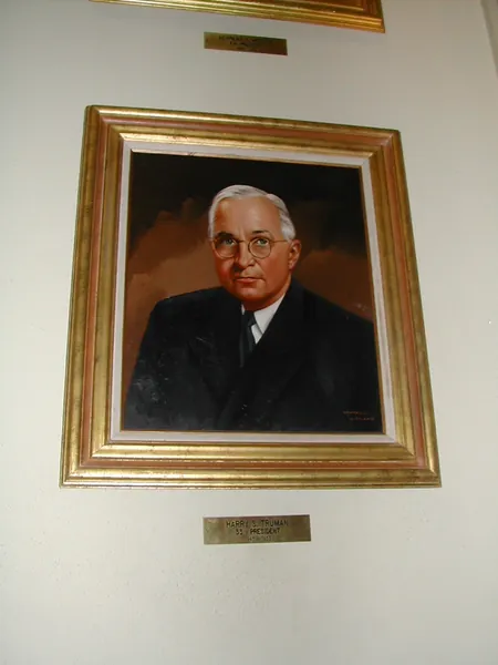 A second framed portrait in the gallery.