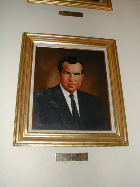 A third framed portrait in the gallery.