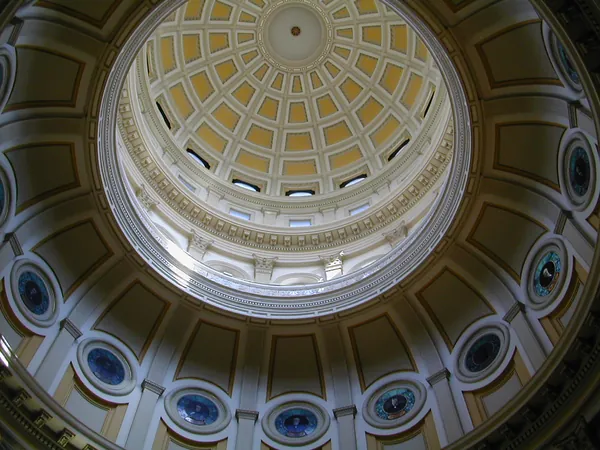 An ornate domed ceiling viewed from below.