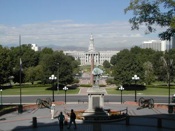 A civic building and statue viewed from above.