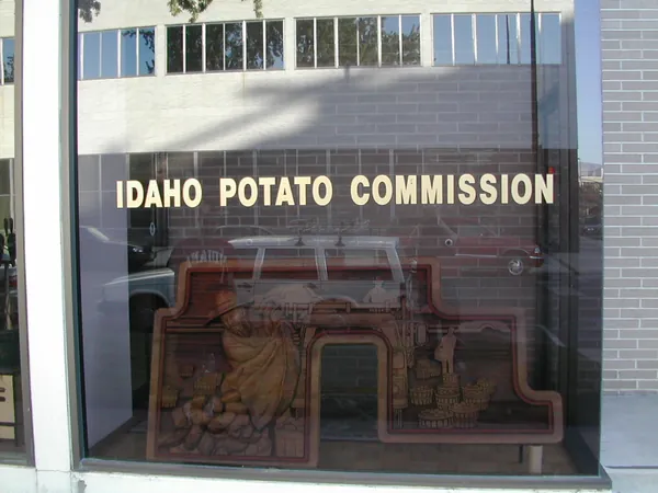 An Idaho Potato Commission display in a storefront.
