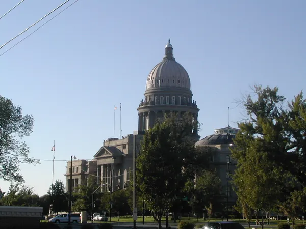 The capitol dome lit by evening sun.