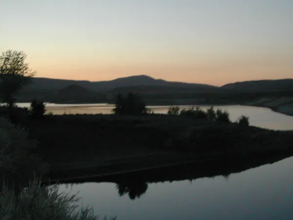 A reservoir reflecting the last light of day.