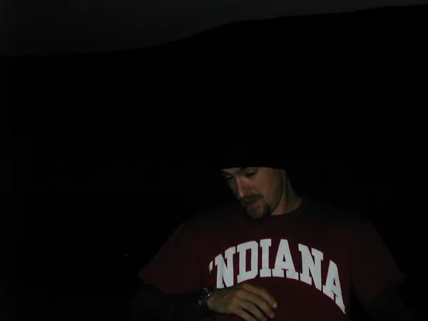 A traveler rides in the vehicle at night.